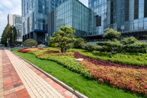 Sidewalk with colorful landscape in front of office buildings