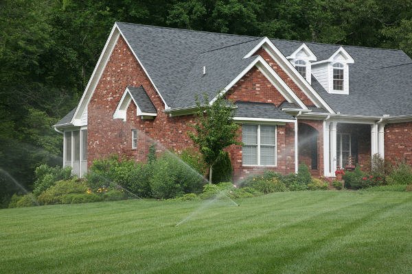 Sprinklers in front of home
